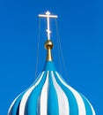 The golden cross on the Orthodox Temple against the blue sky Royalty Free Stock Photo