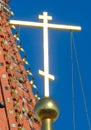 The golden cross on the Orthodox Temple against the blue sky Royalty Free Stock Photo