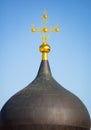 The golden cross on the Orthodox Temple against the blue sky Royalty Free Stock Photo