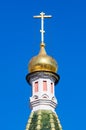 The golden cross on the Orthodox Temple against the blue sky Royalty Free Stock Photo