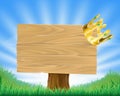 Golden crown hanging on sign Royalty Free Stock Photo