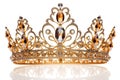 Golden crown inlaid with precious stones isolated on a white background. Royal decoration