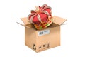 Golden crown inside cardboard box, delivery concept. 3D rendering