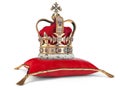 Golden crown on red velvet pillow for coronation. Royal symbol of british UK monarchy