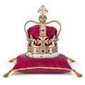 Golden crown on red velvet pillow for coronation. Royal symbol of british UK monarchy Royalty Free Stock Photo