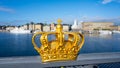 Golden Crown of Skeppsholmen Bridge in Stockholm Royalty Free Stock Photo