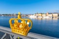 Golden Crown of Skeppsholmen Bridge in Stockholm Royalty Free Stock Photo