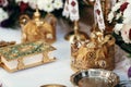 golden crowns and holy bible on altar in church at wedding ceremony, spiritual place, religious moment