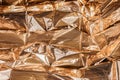 Golden crumpled foil texture Royalty Free Stock Photo