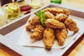 Golden Crunchy Korean Fried Chicken basic Huraideu-Chikin served with pickled and Soju.