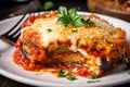 Golden Crusted Eggplant Parmesan Baked to Perfection with a Rich Tomato Sauce and Melted Mozzarella Cheese