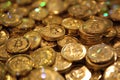 Golden crypto currency coins with bitcoin symbol on metallic background