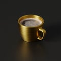 Golden cup with strong coffee on a black background, studio shooting