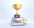 Golden cup, trophy or winner prize stand on stack books. Achievement in education, study award, successful student