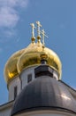 Golden Cupola Of Russian Orthodox Church Under Blue Sky