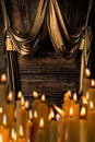 Golden curtains and burning candles Royalty Free Stock Photo