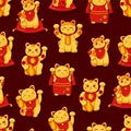 Golden cute Japanese cats of Good luck Maneki Neko seamless pattern. For printing on paper and fabric. Symbol wealth Royalty Free Stock Photo
