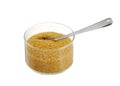 Golden demerara sugar in glass bowl with teaspoon Royalty Free Stock Photo