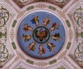 Golden detail of the ornate ceiling in the Hermitage museum of art and culture in Saint Petersburg, Russia in the Winter Palace Royalty Free Stock Photo