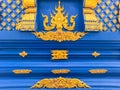 Golden details of ornamentation of Wat Rong Suea Ten Blue Temple at Chiang Rai Thailand