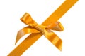 Golden diagonal ribbone with bow,isolated