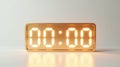 Golden digital clock displaying midnight time zero hour minute second timekeeping device object Royalty Free Stock Photo