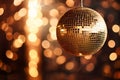 Golden disco mirror ball on a golden background Royalty Free Stock Photo