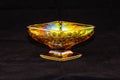 Golden dish three inches high, six inches wide Royalty Free Stock Photo