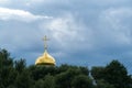 Golden dome of a church on a cloud background Royalty Free Stock Photo