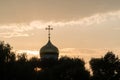 Golden dome of a church on a cloud background Royalty Free Stock Photo