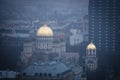 Golden dome church in the middle of the city Royalty Free Stock Photo