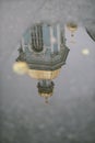 Golden dome church water reflection