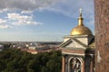Golden dome of St. Isaac's Cathedral and museum in Saint Petersburg, Russia with a cross on top Royalty Free Stock Photo