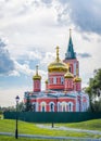 Golden dome and a tower with bells of Znamensky Orthodox Church built in 1858 in the city of Barnaul, Russia