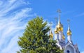 Golden domes of the Orthodox Church, white clouds Royalty Free Stock Photo