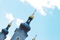 Golden domes of the temple against the blue sky Royalty Free Stock Photo