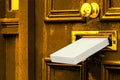 Golden door. Mailbox letterbox gift parcel package box. Royalty Free Stock Photo