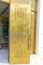 golden door from outside of Katedralja building "ngjallja and Krishtit"
 capital Tirana in Albania. Royalty Free Stock Photo