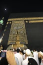 MECCA, SAUDI ARABIA - MAY 01 2018: The golden doors of the Holy Kaaba closeup, covered with Kiswah. Massive lock on the doors. Ent