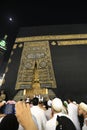 MECCA, SAUDI ARABIA - MAY 01 2018: The golden doors of the Holy Kaaba closeup, covered with Kiswah. Massive lock on the doors. Ent