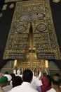 MECCA, SAUDI ARABIA - MAY 01 2018: The golden doors of the Holy Kaaba closeup, covered with Kiswah. Massive lock on the doors. Ent