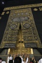 MECCA, SAUDI ARABIA - MAY 01 2018: The golden doors of the Holy Kaaba closeup, covered with Kiswah. Massive lock on the doors. Ent