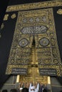 MECCA, SAUDI ARABIA - MAY 01 2018: The golden doors of the Holy Kaaba closeup, covered with Kiswah. Massive lock on the doors. Ent