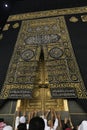 MECCA, SAUDI ARABIA - MAY 01 2018: The golden doors of the Holy Kaaba closeup, covered with Kiswah. Massive lock on the doors. Ent