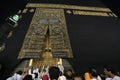 MECCA, SAUDI ARABIA - MAY 01 2018: The golden doors of the Holy Kaaba closeup, covered with Kiswah. Massive lock on the doors. Ent