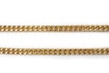 Golden double chain rows isolated on white background,  soft focus close up Royalty Free Stock Photo