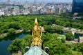 Golden dragon fish statue or Shachihoko at roof top and aerial v Royalty Free Stock Photo