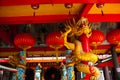 Golden dragon on the pole. Red Chinese lantern. Temple Tua Pek Kong. Miri city, Borneo, Sarawak, Malaysia