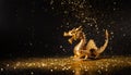 golden dragon small statue against black background and gold sprinkles