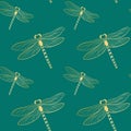 Golden dragonflies on emerald background seamless pattern. Royalty Free Stock Photo